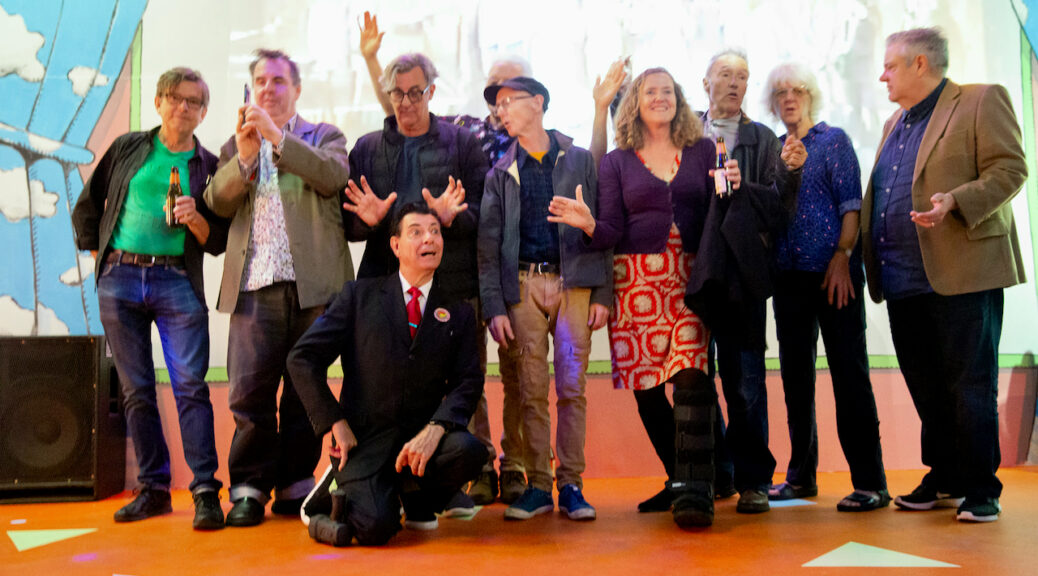 Castanet Club members pose onstage at final night of The Castanet Club exhibition