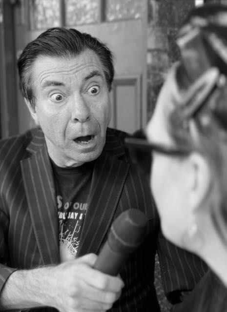Maynard is turned black and white with shock.