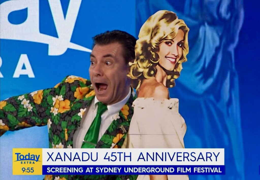 Maynard demonstrates one way to pose with Olivia Cardboard-John.