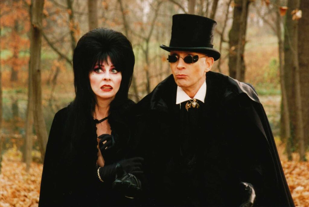 Elvira and Richard O'Brien in a scene from Elviras Haunted Hills 2001.